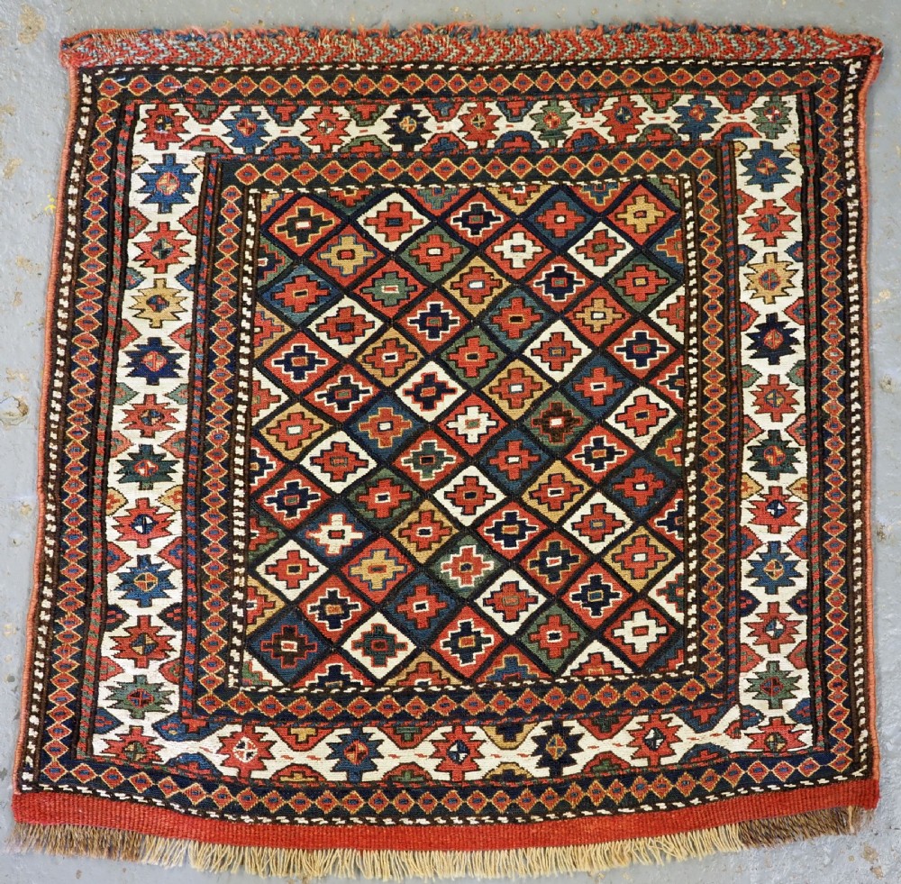 ANTIQUE SHAHSAVAN BAG FACE IN SOUMAK TECHNIQUE, CIRCA 1880.