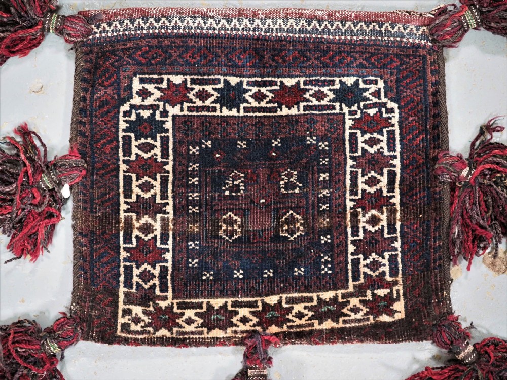 ANTIQUE BALUCH DOUBLE FACED VANITY BAG, SISTAN PROVINCE, AFGHANISTAN, CIRCA 1900. View II