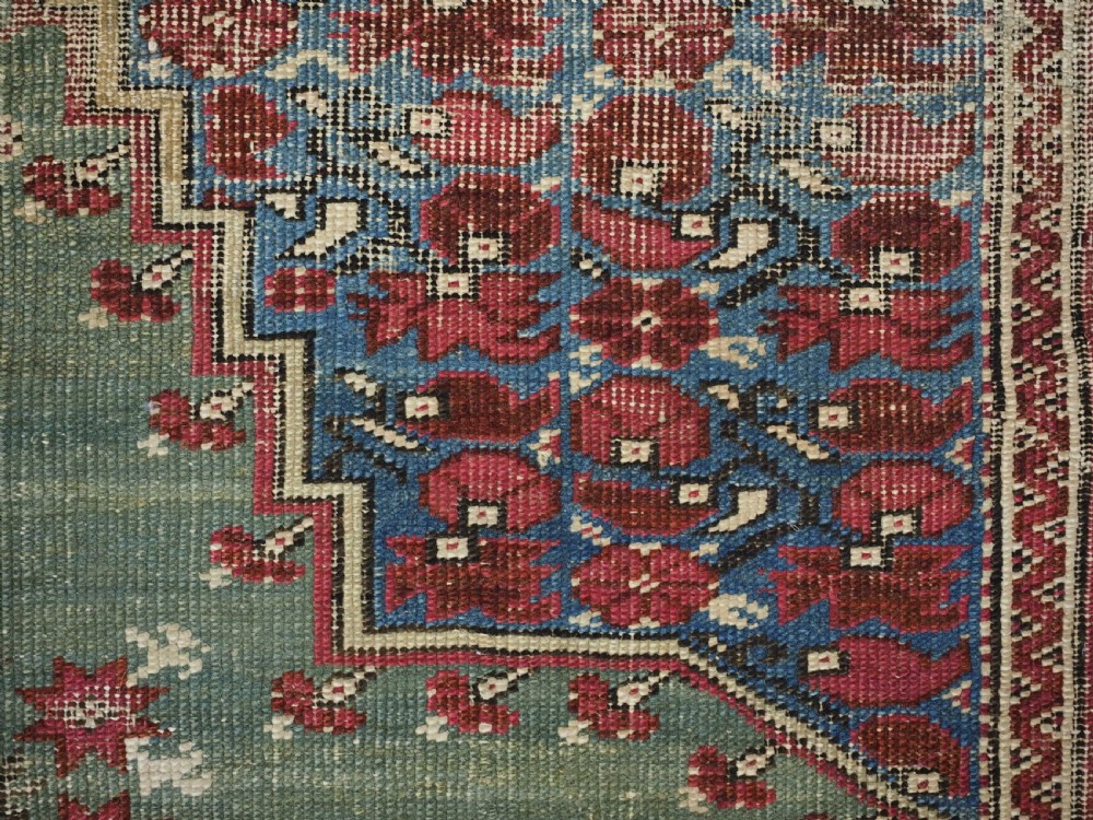 ANTIQUE TURKISH GHIORDES PRAYER RUG, MULTIPLE BORDERS, GREEN FIELD, CIRCA 1750. View XII