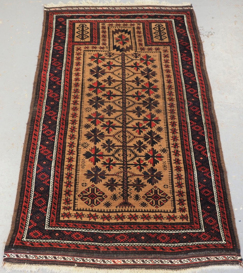 ANTIQUE BALUCH PRAYER RUG, 'SARAKHS' BALUCH, CAMEL GROUND, LATE 19TH CENTURY.