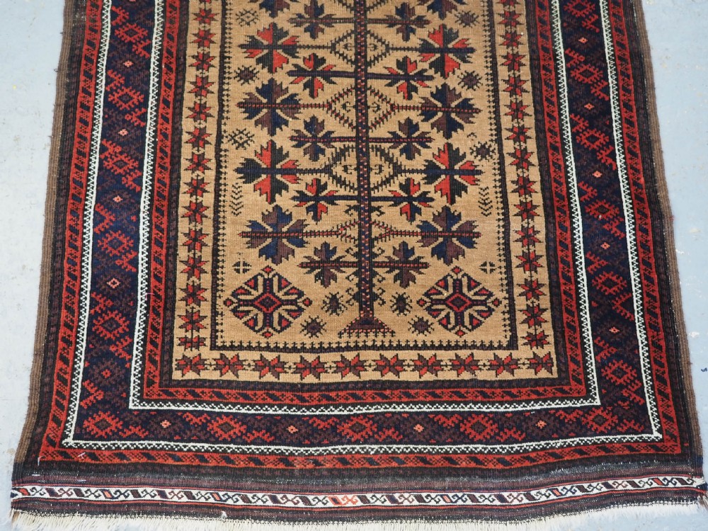 ANTIQUE BALUCH PRAYER RUG, 'SARAKHS' BALUCH, CAMEL GROUND, LATE 19TH CENTURY. View V