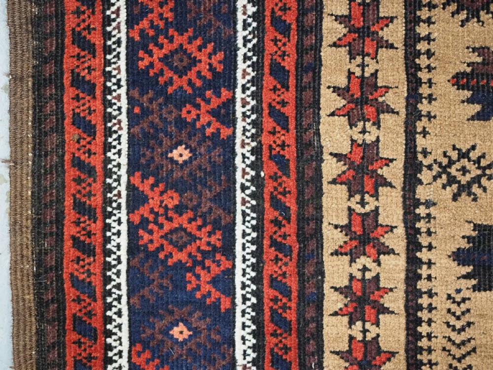 ANTIQUE BALUCH PRAYER RUG, 'SARAKHS' BALUCH, CAMEL GROUND, LATE 19TH CENTURY. View IX