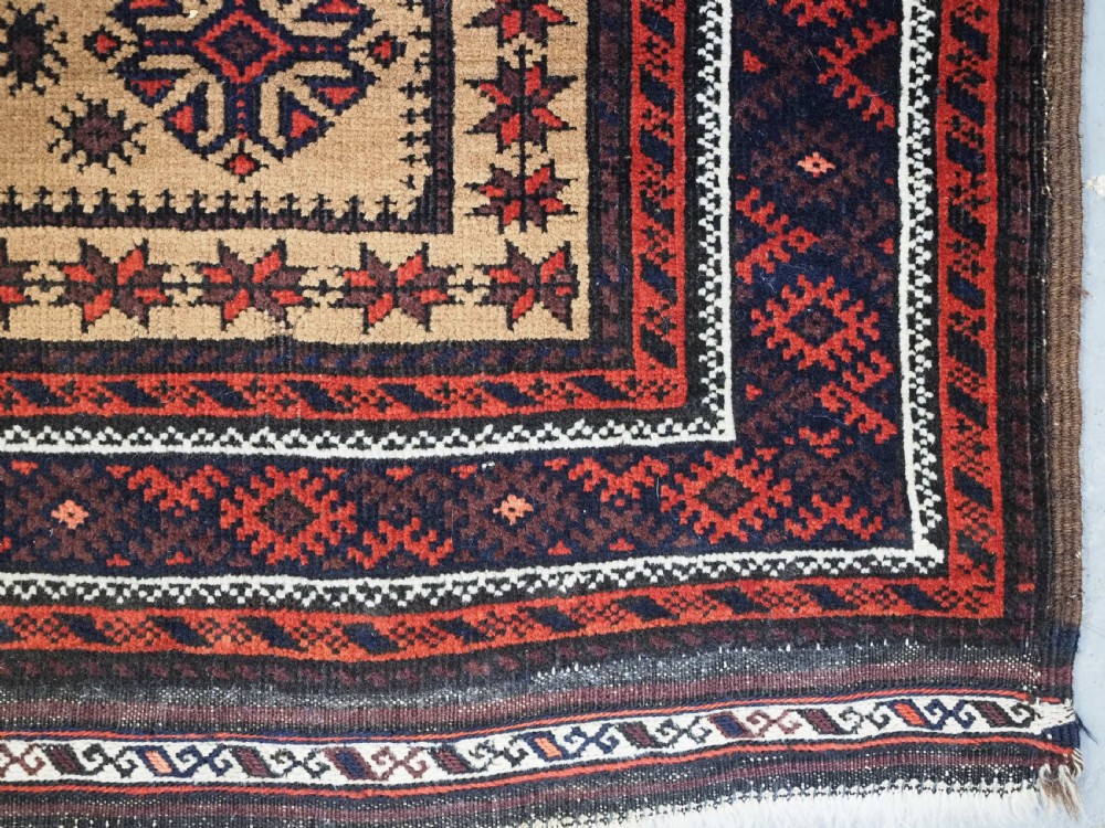 ANTIQUE BALUCH PRAYER RUG, 'SARAKHS' BALUCH, CAMEL GROUND, LATE 19TH CENTURY. View X
