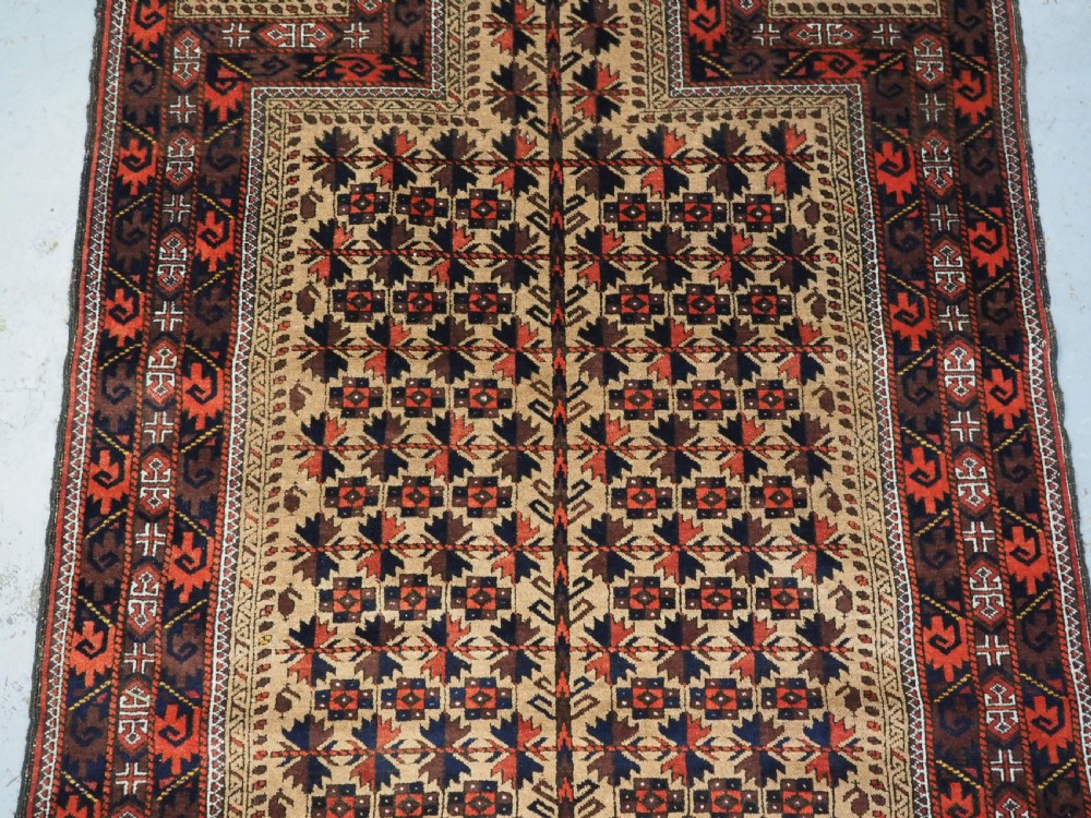 ANTIQUE BALUCH PRAYER RUG, CAMEL GROUND WITH TREE OF LIFE, CIRCA 1900. View IV