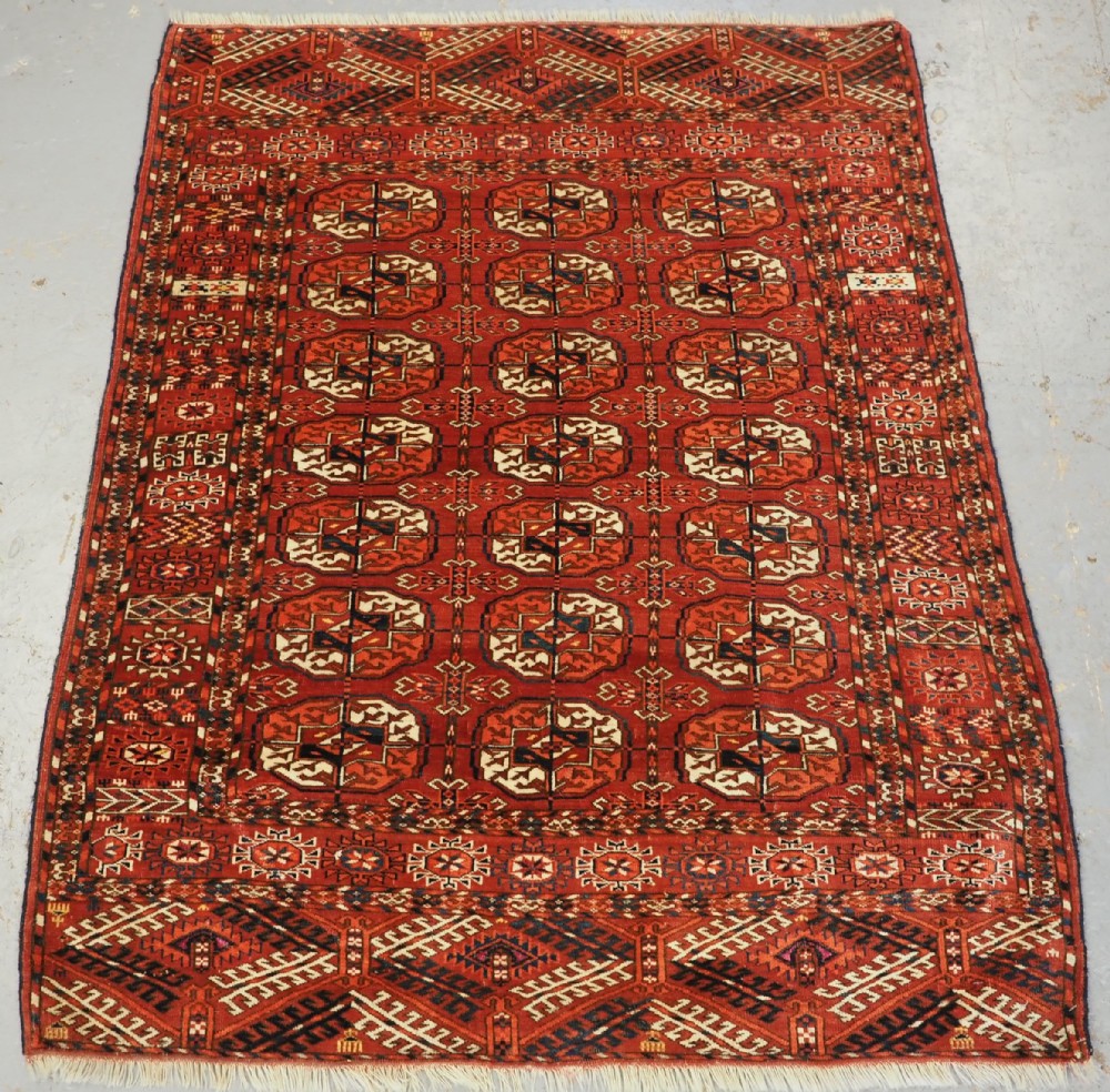 ANTIQUE TEKKE TURKMEN 'WEDDING' DOWRY RUG, WITH SILK HIGHLIGHTS, CIRCA 1900.