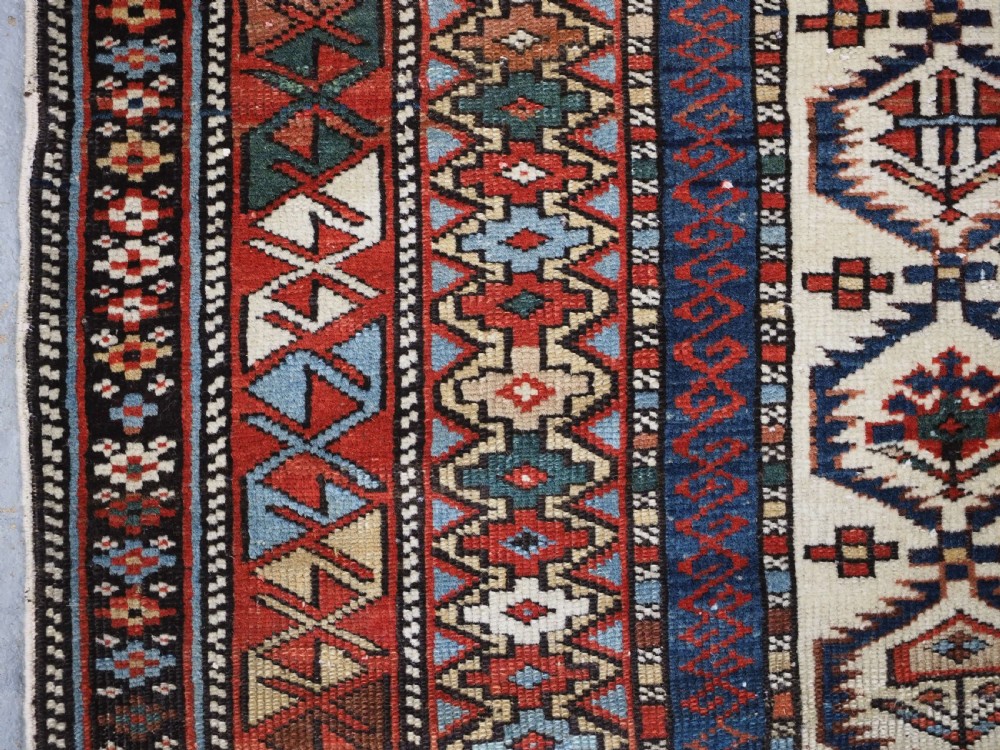 ANTIQUE CAUCASIAN DAGESTAN RUG WITH IVORY GROUND FLORAL LATTICE, SUPERB, CIRCA 1880. View VII