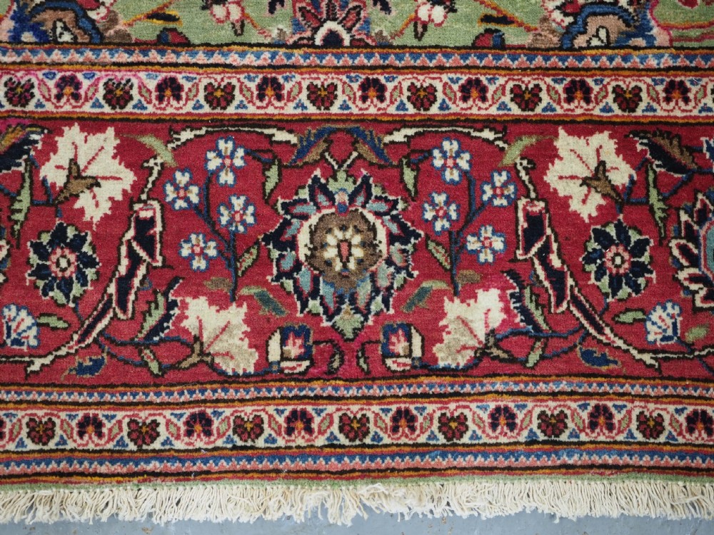 ANTIQUE KASHAN RUG WITH FINE FLORAL DESIGN ON A SCARCE GREEN GROUND, CIRCA 1900. View XI