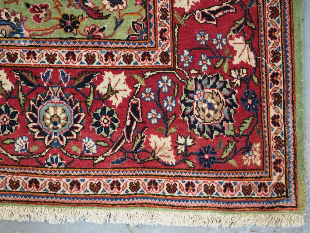 ANTIQUE KASHAN RUG WITH FINE FLORAL DESIGN ON A SCARCE GREEN GROUND, CIRCA 1900. View XII