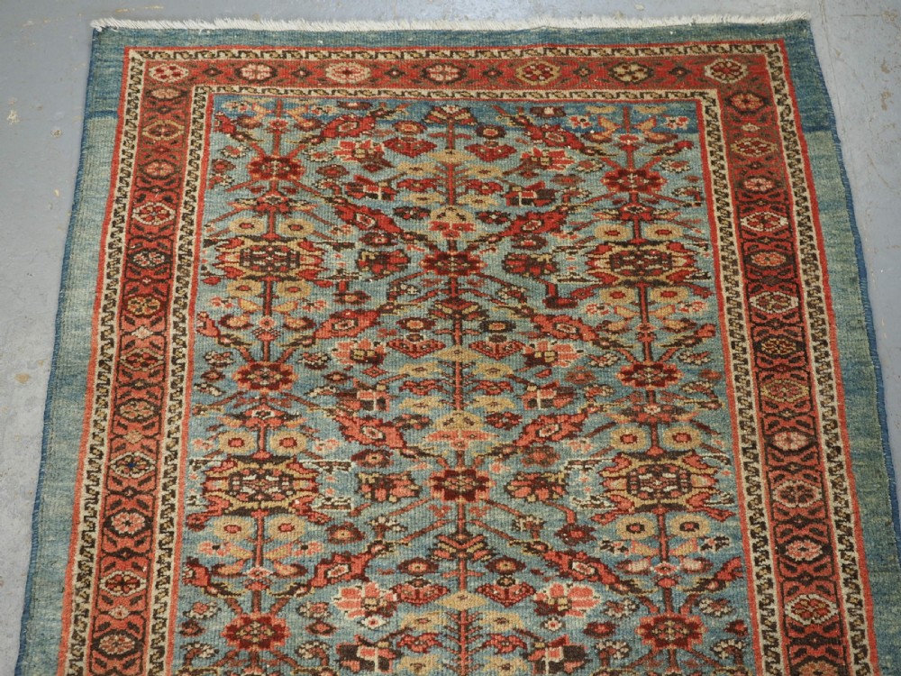 ANTIQUE ZIEGLER RUG WITH SHRUB DESIGN, POWDER BLUE GROUND, CIRCA 1890. View III
