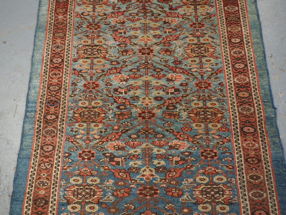 ANTIQUE ZIEGLER RUG WITH SHRUB DESIGN, POWDER BLUE GROUND, CIRCA 1890. View IV