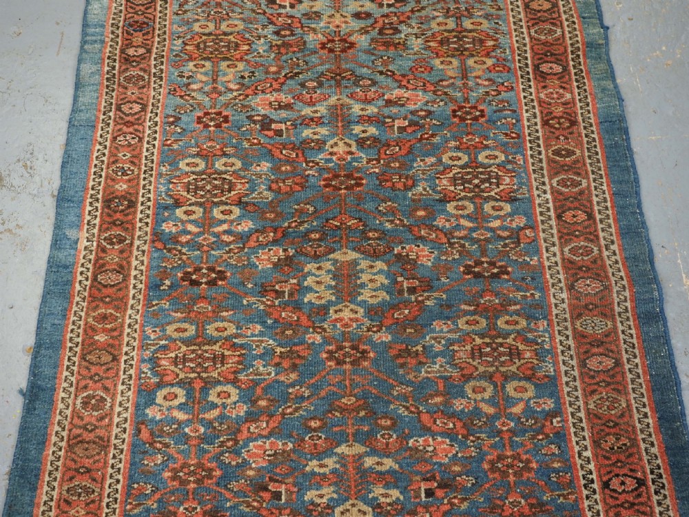 ANTIQUE ZIEGLER RUG WITH SHRUB DESIGN, POWDER BLUE GROUND, CIRCA 1890. View V