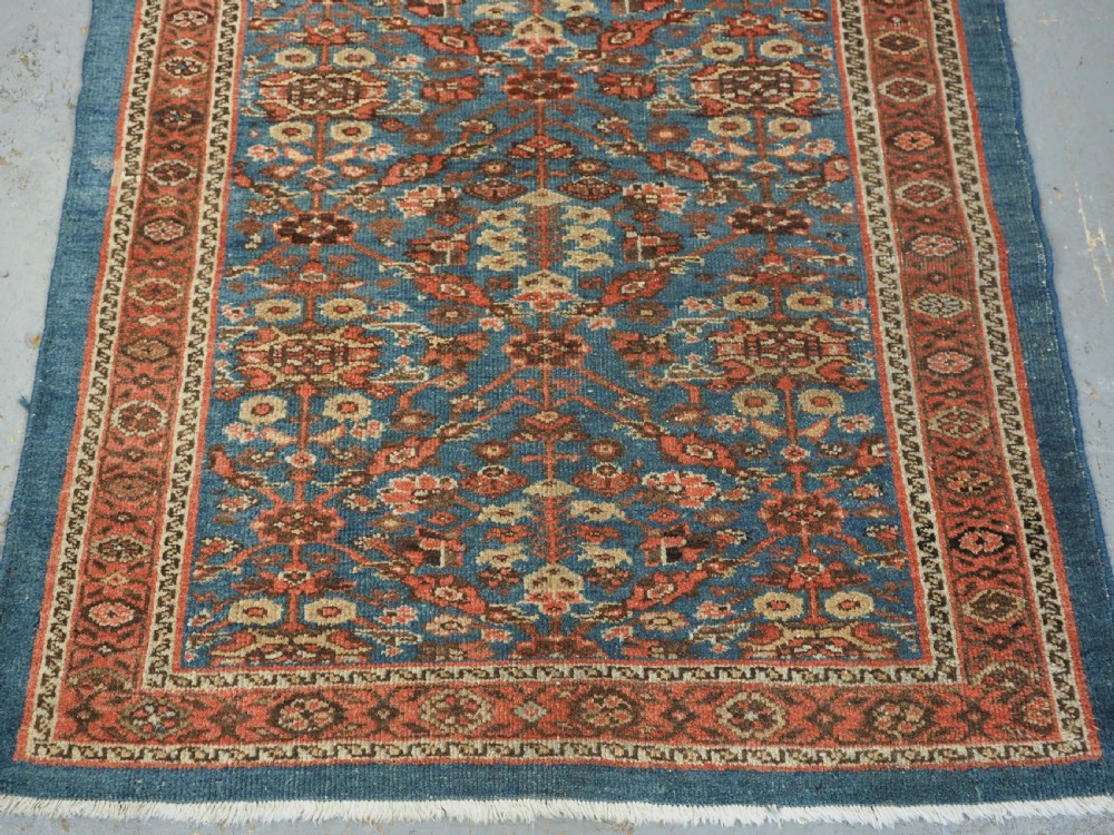 ANTIQUE ZIEGLER RUG WITH SHRUB DESIGN, POWDER BLUE GROUND, CIRCA 1890. View VI