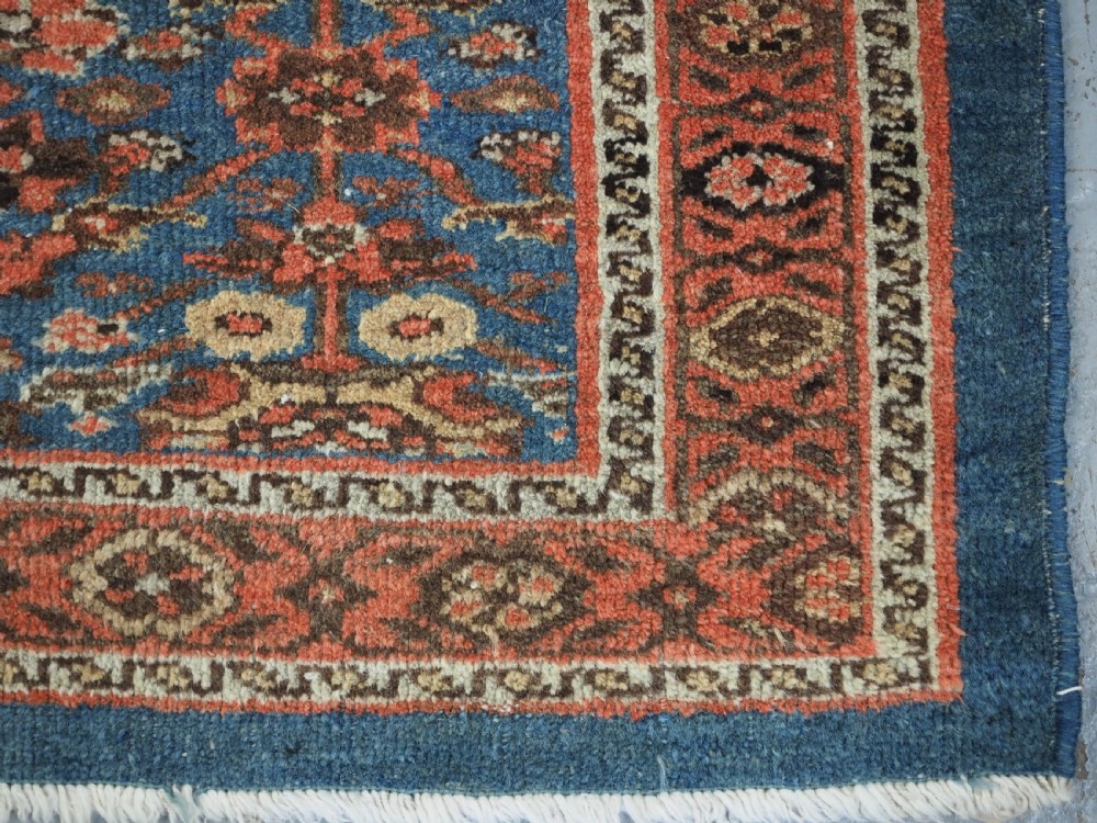 ANTIQUE ZIEGLER RUG WITH SHRUB DESIGN, POWDER BLUE GROUND, CIRCA 1890. View XII