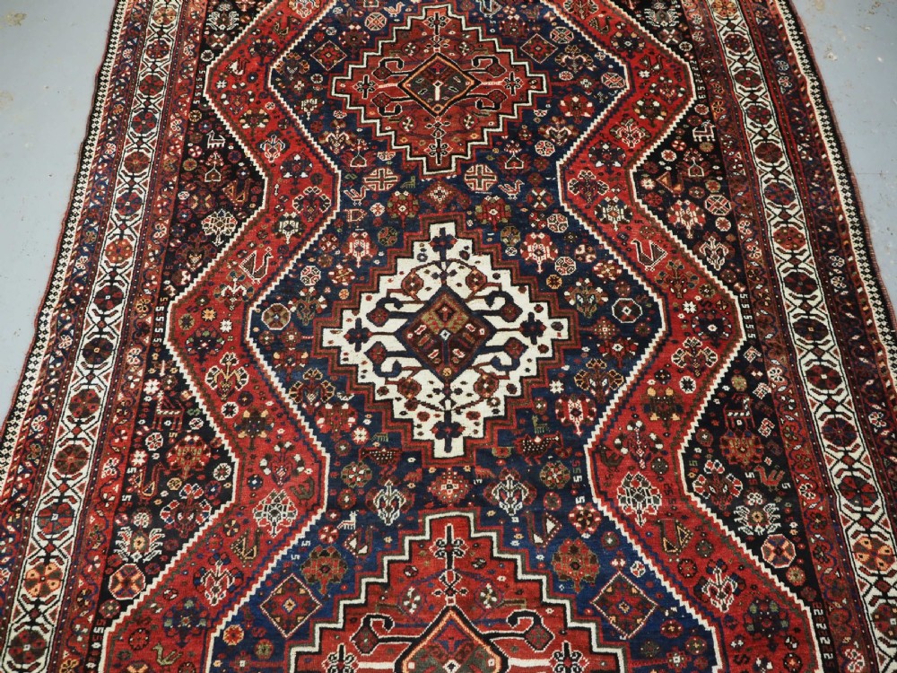 ANTIQUE TRIBAL RUG, SHIRAZ REGION, OUTSTANDING CONDITION, DATED 1921. View IV