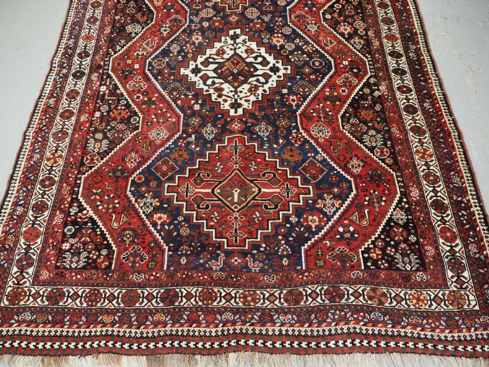ANTIQUE TRIBAL RUG, SHIRAZ REGION, OUTSTANDING CONDITION, DATED 1921. View V