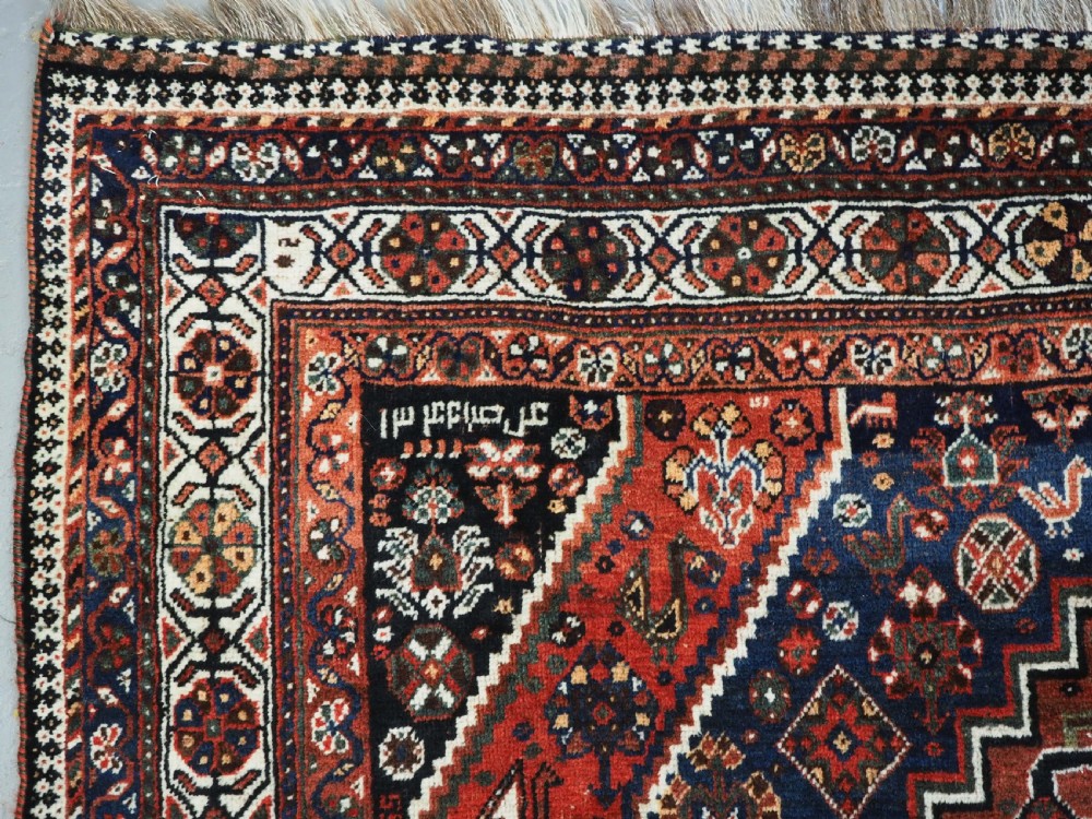ANTIQUE TRIBAL RUG, SHIRAZ REGION, OUTSTANDING CONDITION, DATED 1921. View VI