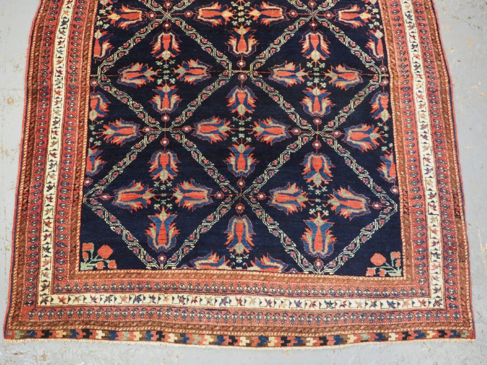 ANTIQUE AFSHAR TRIBAL RUG WITH LATTICE AND TULIP DESIGN, CIRCA 1890. View IV