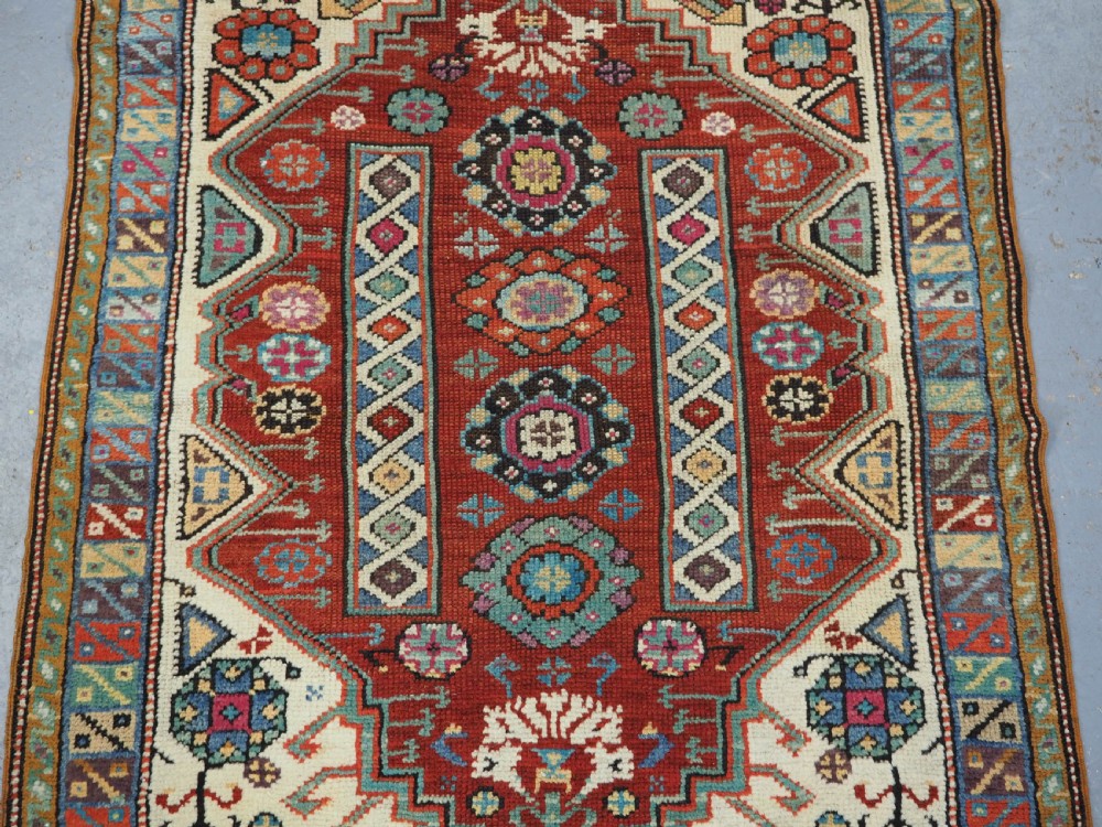 ANTIQUE TURKISH MIHALICIK VILLAGE RUG, FLORAL DESIGN, CIRCA 1900. View IV