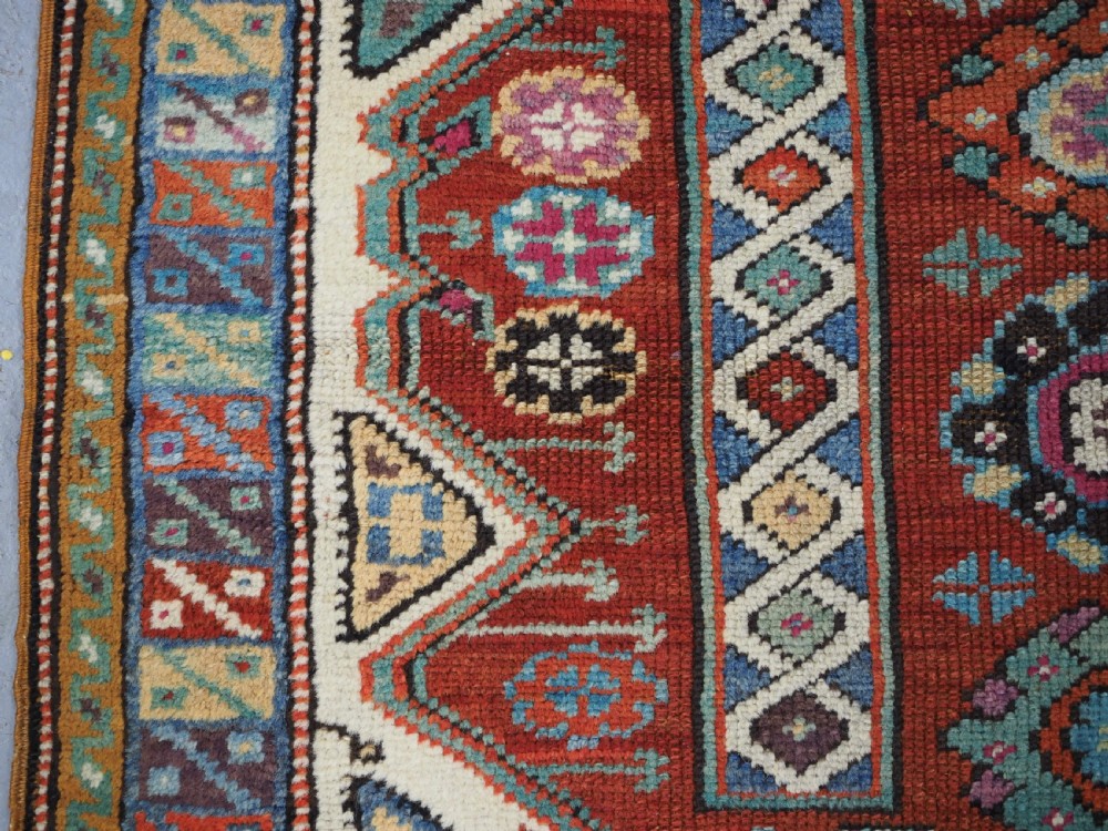 ANTIQUE TURKISH MIHALICIK VILLAGE RUG, FLORAL DESIGN, CIRCA 1900. View VI