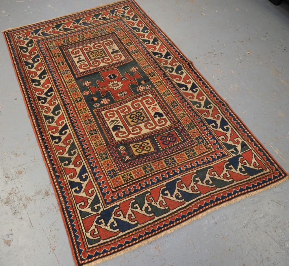 ANTIQUE CAUCASIAN KARACHOV KAZAK, GREEN GROUND, CIRCA 1880. View II