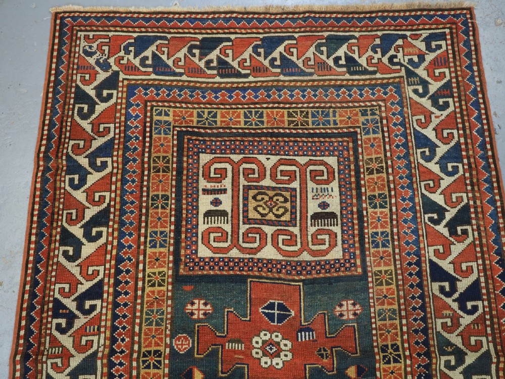 ANTIQUE CAUCASIAN KARACHOV KAZAK, GREEN GROUND, CIRCA 1880. View III