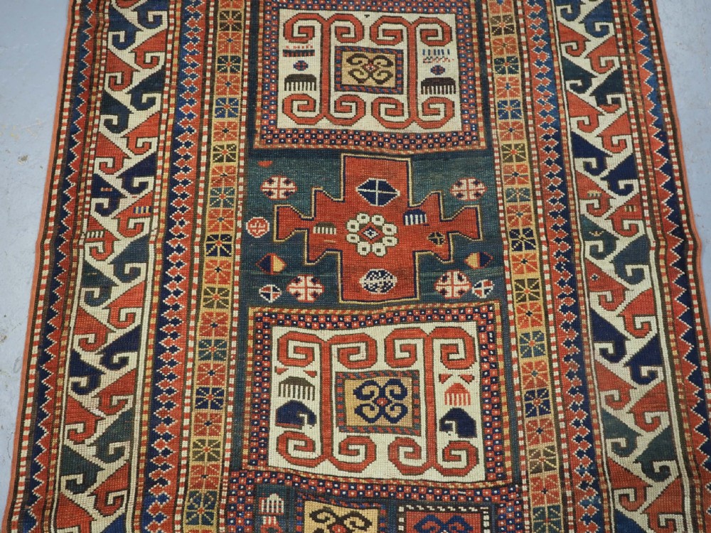 ANTIQUE CAUCASIAN KARACHOV KAZAK, GREEN GROUND, CIRCA 1880. View IV