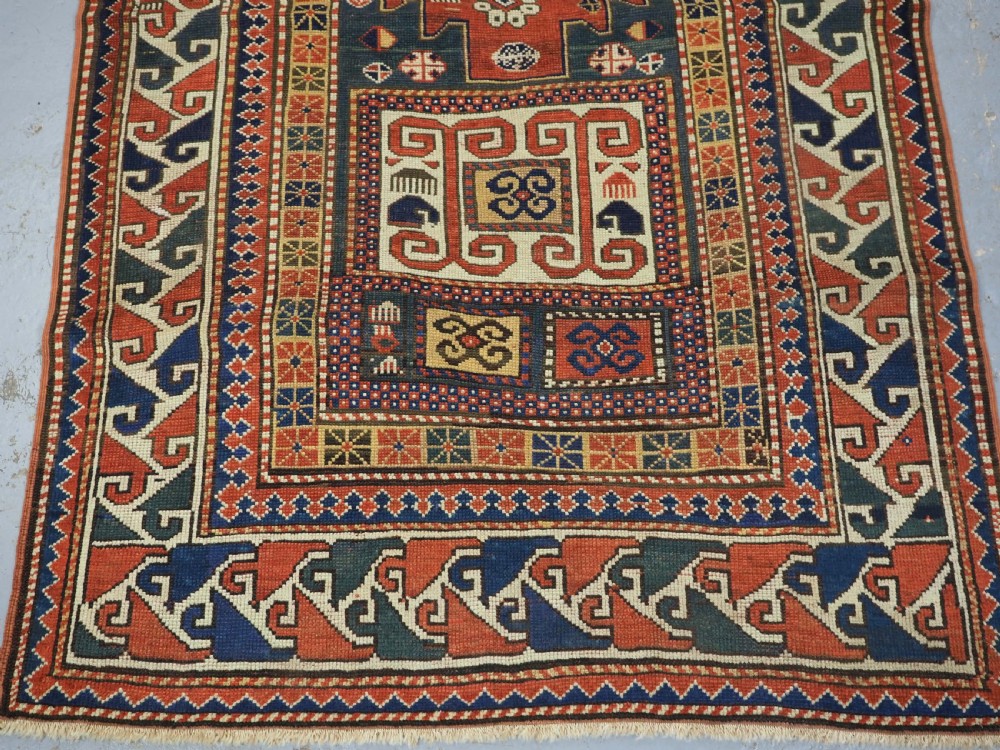 ANTIQUE CAUCASIAN KARACHOV KAZAK, GREEN GROUND, CIRCA 1880. View V