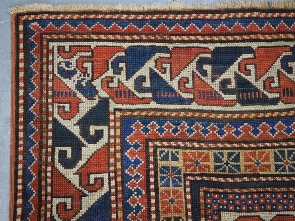 ANTIQUE CAUCASIAN KARACHOV KAZAK, GREEN GROUND, CIRCA 1880. View VI