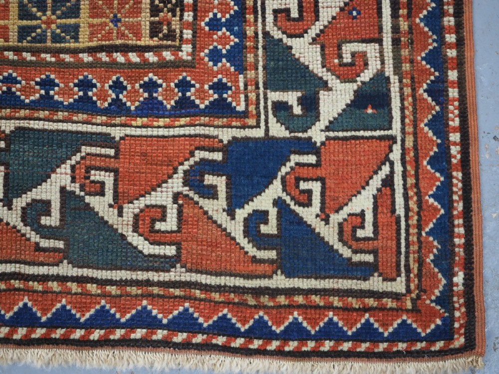 ANTIQUE CAUCASIAN KARACHOV KAZAK, GREEN GROUND, CIRCA 1880. View X