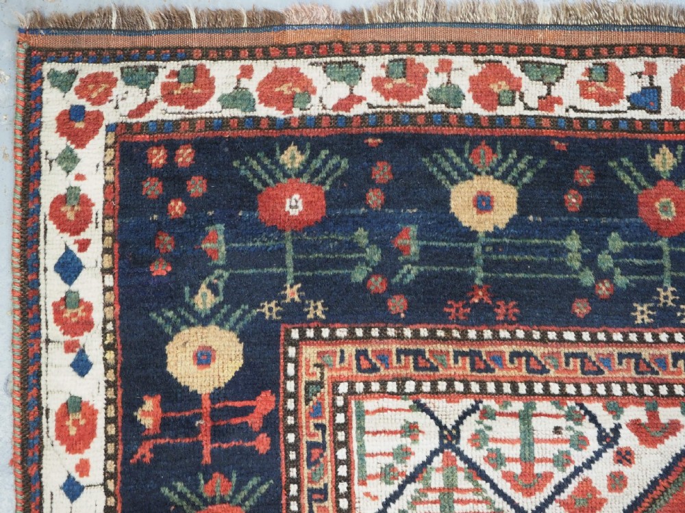 ANTIQUE TRIBAL KHAMSEH RUG WITH BOTEH AND POMEGRANATE DESIGN, CIRCA 1860. View VI