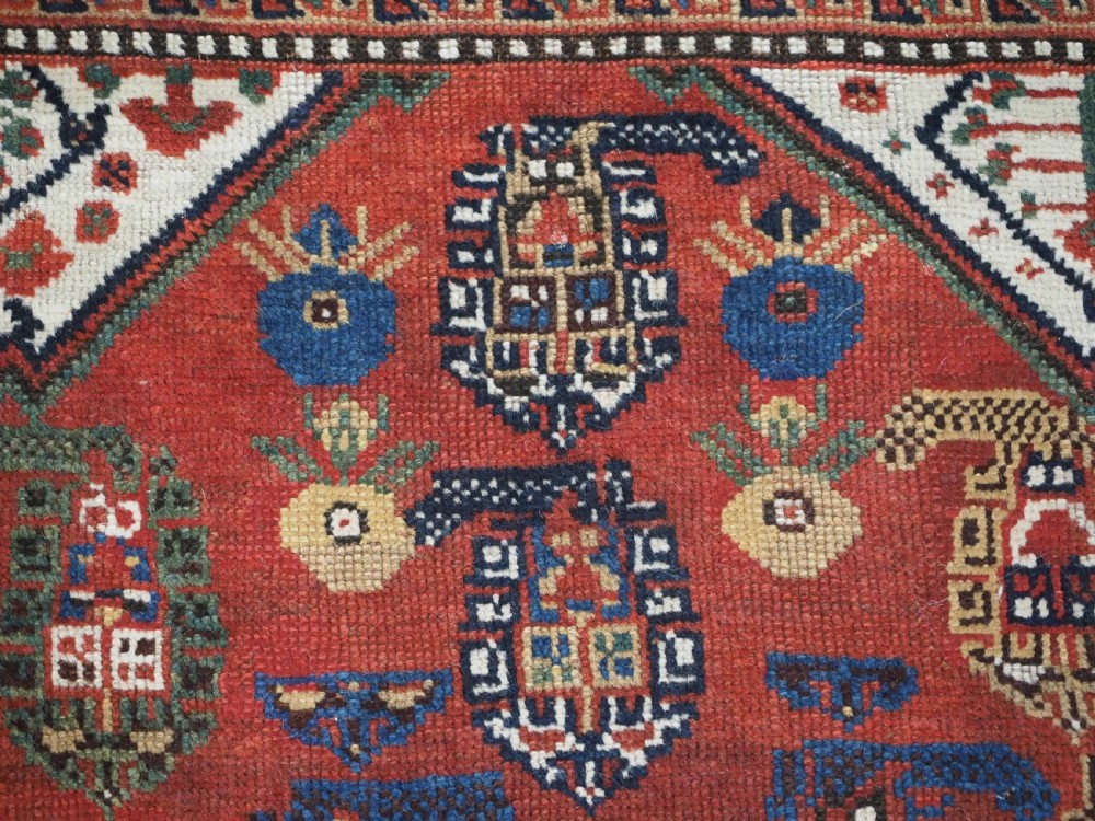 ANTIQUE TRIBAL KHAMSEH RUG WITH BOTEH AND POMEGRANATE DESIGN, CIRCA 1860. View IX