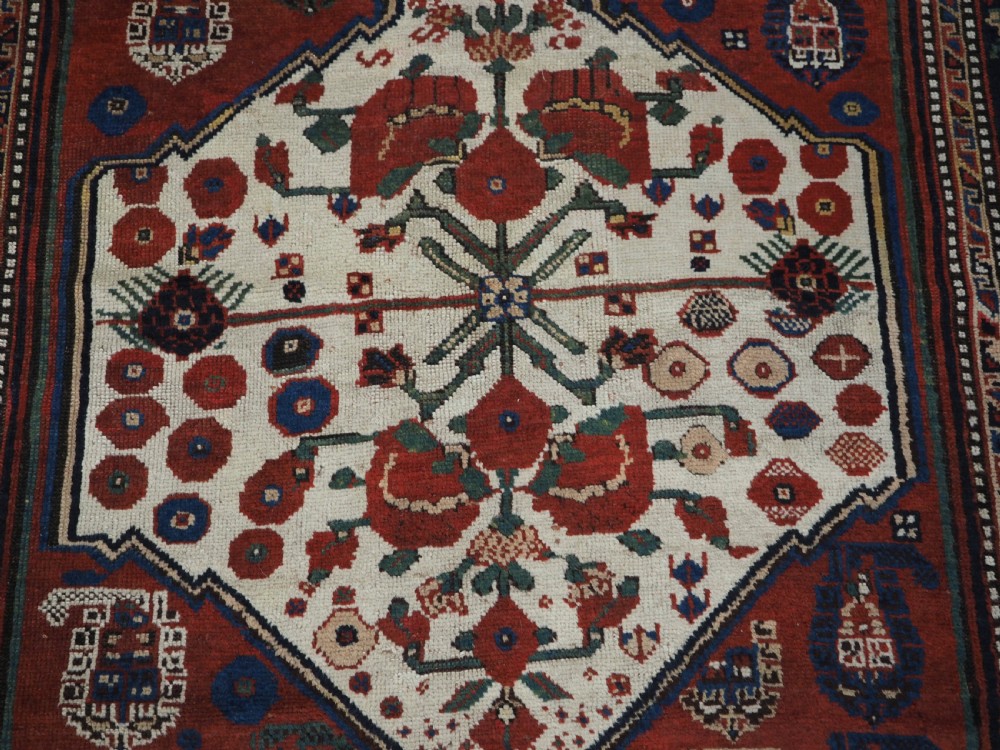 ANTIQUE TRIBAL KHAMSEH RUG WITH BOTEH AND POMEGRANATE DESIGN, CIRCA 1860. View XI