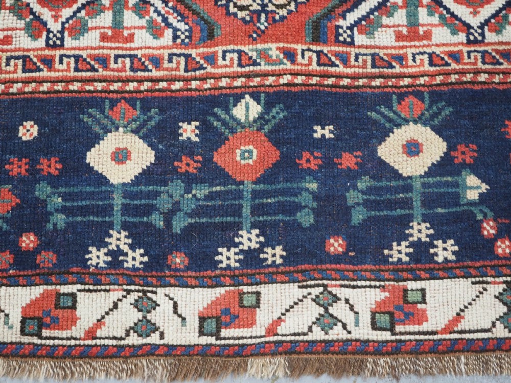 ANTIQUE TRIBAL KHAMSEH RUG WITH BOTEH AND POMEGRANATE DESIGN, CIRCA 1860. View XIII