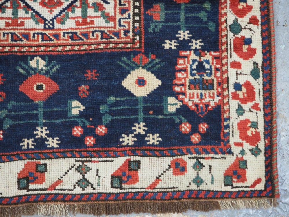 ANTIQUE TRIBAL KHAMSEH RUG WITH BOTEH AND POMEGRANATE DESIGN, CIRCA 1860. View XIV