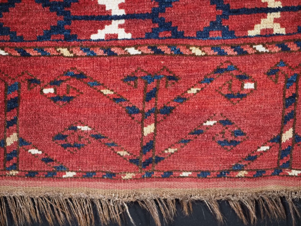 ANTIQUE ERSARI BESHIR TURKMEN CHUVAL FACE WITH IKAT DESIGN, CIRCA 1880. View VIII