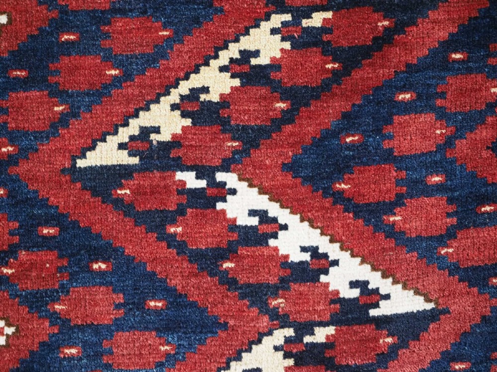 ANTIQUE ERSARI BESHIR TURKMEN CHUVAL FACE WITH IKAT DESIGN, CIRCA 1880. View IX