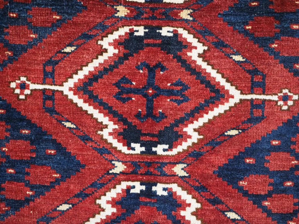 ANTIQUE ERSARI BESHIR TURKMEN CHUVAL FACE WITH IKAT DESIGN, CIRCA 1880. View X