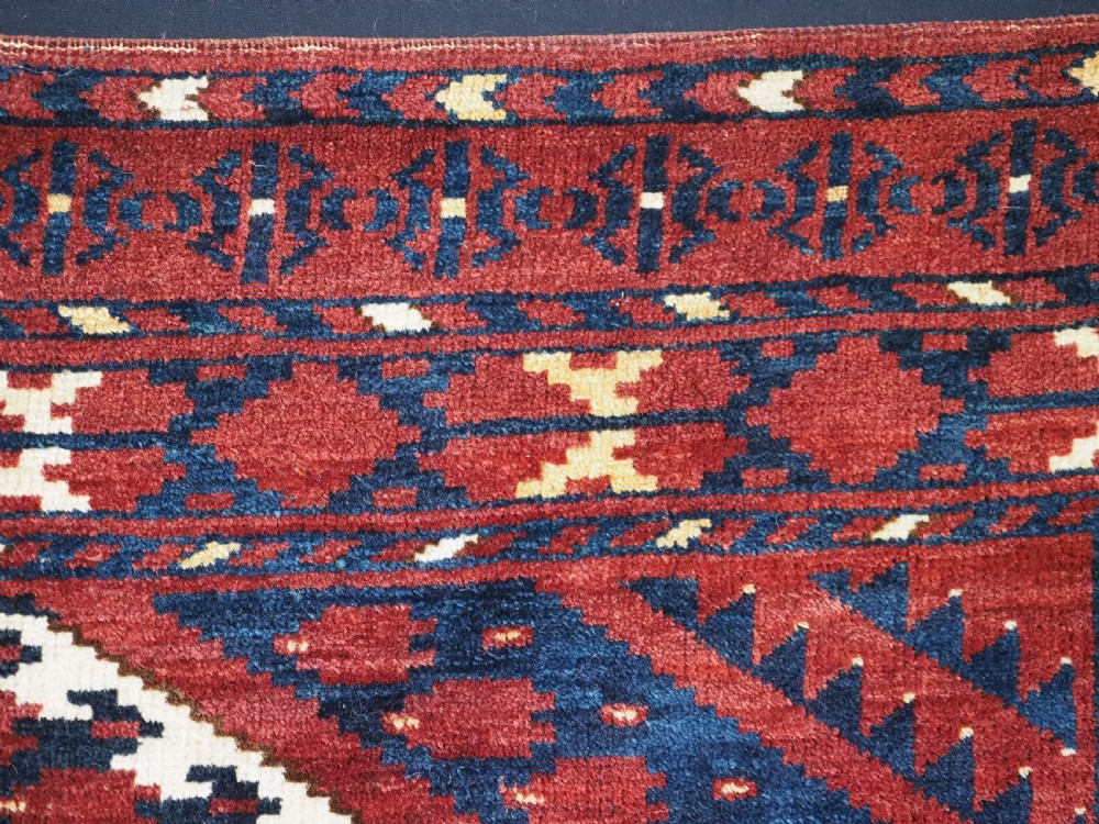 ANTIQUE ERSARI BESHIR TURKMEN CHUVAL FACE WITH IKAT DESIGN, CIRCA 1880. View XI