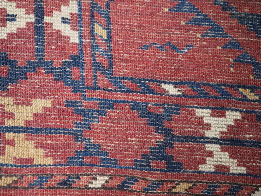 ANTIQUE ERSARI BESHIR TURKMEN CHUVAL FACE WITH IKAT DESIGN, CIRCA 1880. View XII
