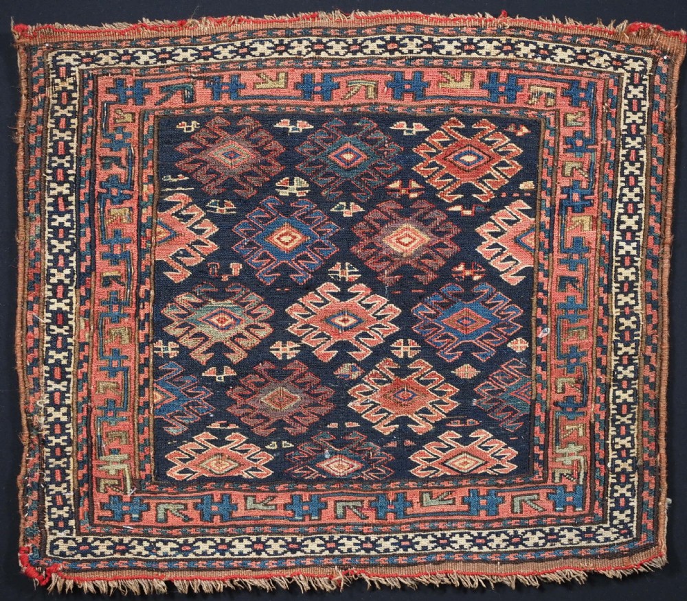 ANTIQUE SHAHSAVAN SADDLE BAG FACE IN SOUMAK TECHNIQUE, CIRCA 1880.