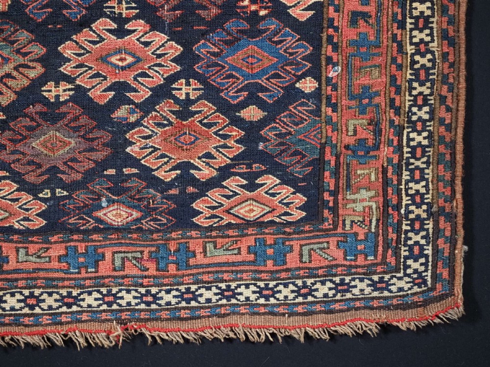 ANTIQUE SHAHSAVAN SADDLE BAG FACE IN SOUMAK TECHNIQUE, CIRCA 1880. View V