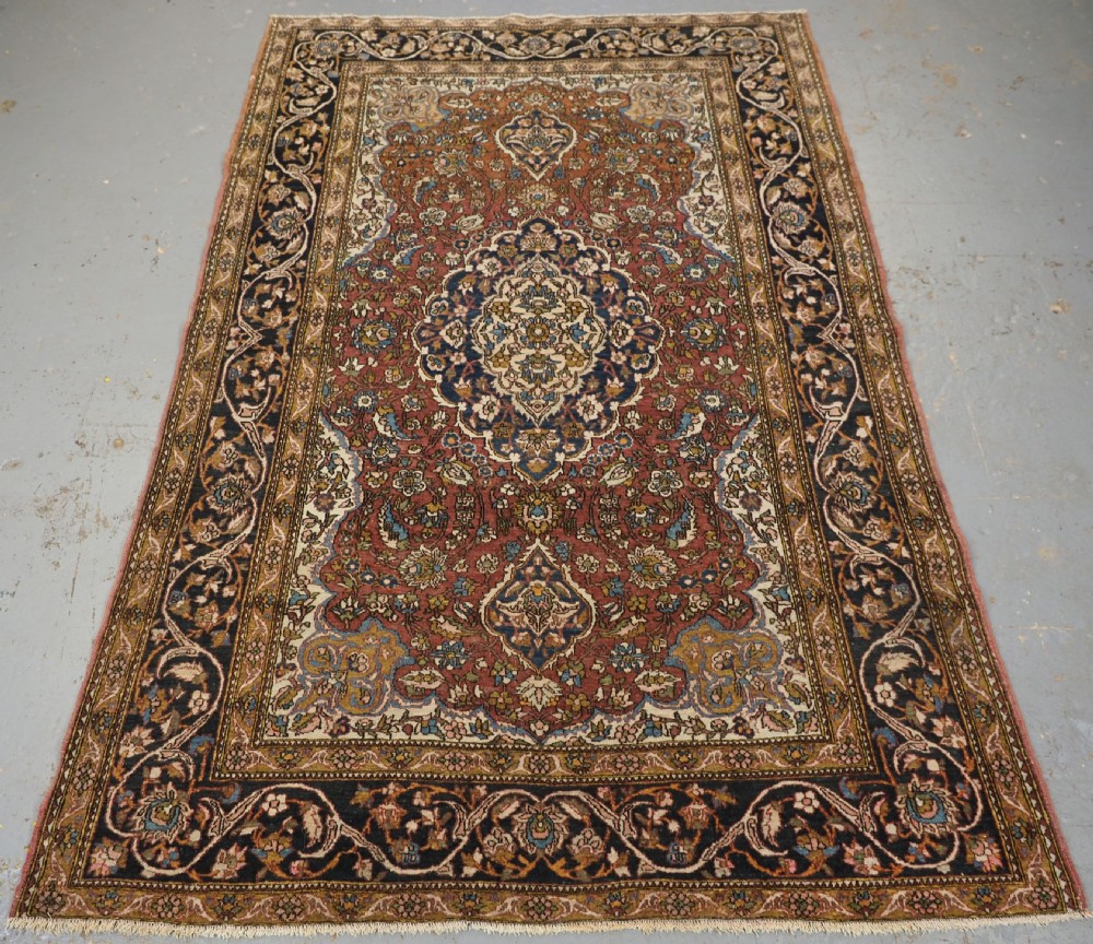 ANTIQUE ISFAHAN REGION VILLAGE RUG, TRADITIONAL DESIGN, (One of a pair b) CIRCA 1920.