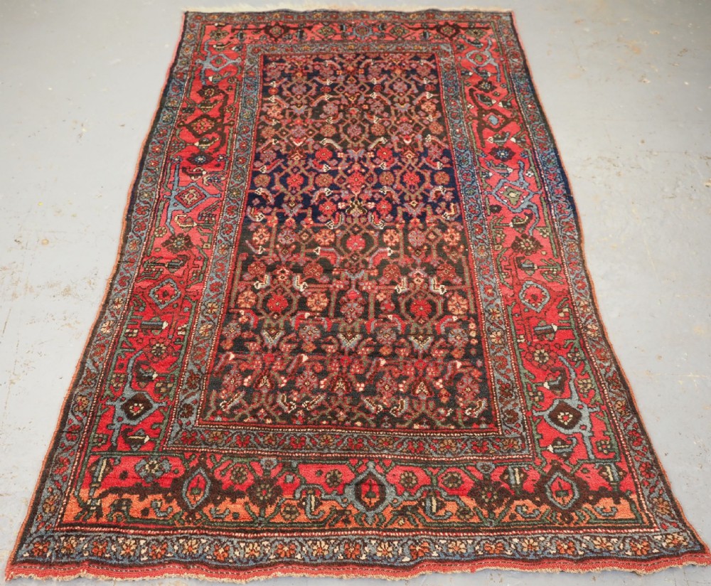 ANTIQUE BIJAR RUG, WOOL FOUNDATION, HERATI DESIGN, CIRCA 1900.