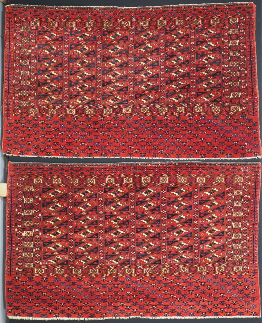 EXCEPTIONAL PAIR OF ANTIQUE TEKKE TURKMEN CHUVAL FACES, SILK HIGHLIGHTS, MID 19TH CENTURY.