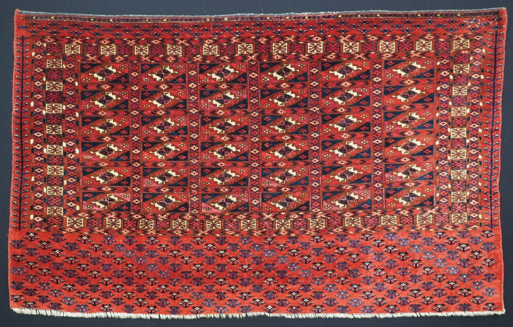 EXCEPTIONAL PAIR OF ANTIQUE TEKKE TURKMEN CHUVAL FACES, SILK HIGHLIGHTS, MID 19TH CENTURY. View II