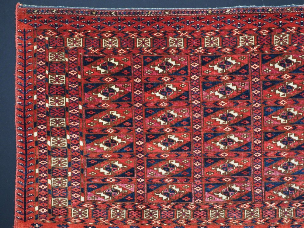 EXCEPTIONAL PAIR OF ANTIQUE TEKKE TURKMEN CHUVAL FACES, SILK HIGHLIGHTS, MID 19TH CENTURY. View III