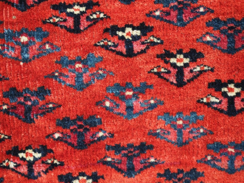 EXCEPTIONAL PAIR OF ANTIQUE TEKKE TURKMEN CHUVAL FACES, SILK HIGHLIGHTS, MID 19TH CENTURY. View VI