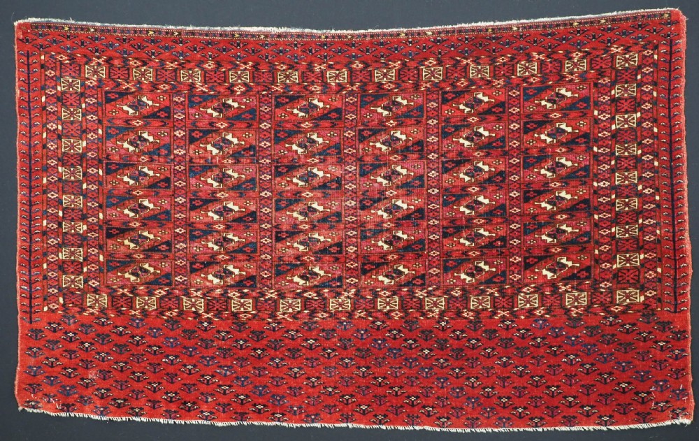 EXCEPTIONAL PAIR OF ANTIQUE TEKKE TURKMEN CHUVAL FACES, SILK HIGHLIGHTS, MID 19TH CENTURY. View VII