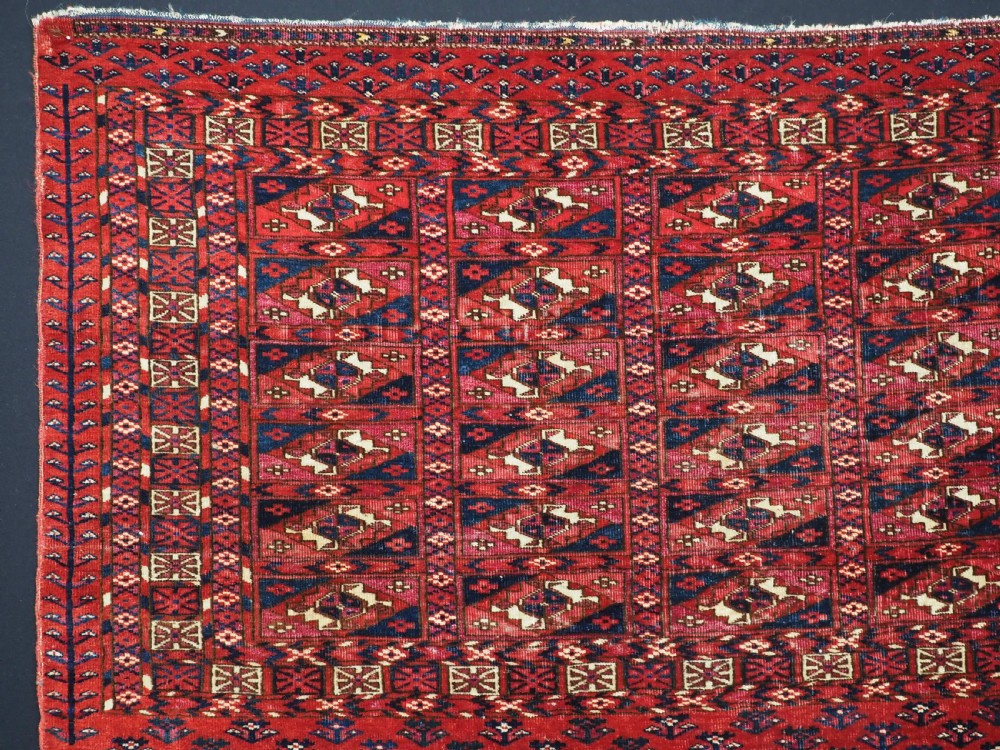 EXCEPTIONAL PAIR OF ANTIQUE TEKKE TURKMEN CHUVAL FACES, SILK HIGHLIGHTS, MID 19TH CENTURY. View VIII