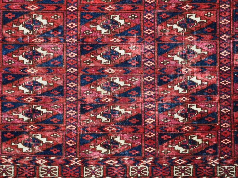 EXCEPTIONAL PAIR OF ANTIQUE TEKKE TURKMEN CHUVAL FACES, SILK HIGHLIGHTS, MID 19TH CENTURY. View IX